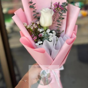 white rose bouquet with gypsophila in pink wrapping – flower delivery Lebanon